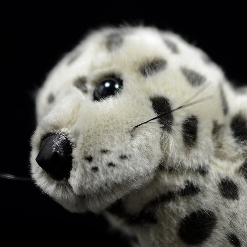 Close-up of spotted seal plush face highlighting realistic whiskers and detailed features by SoftDaysLab