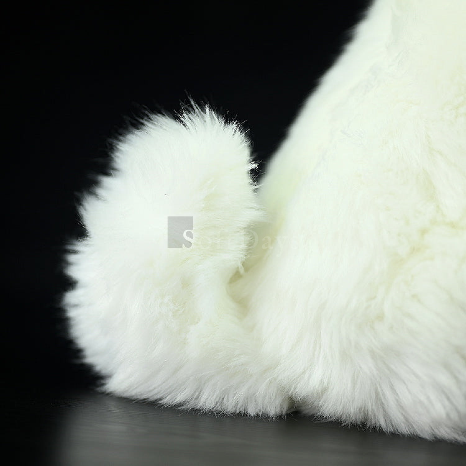Close-up of the curled tail of the Samoyed plush toy, emphasizing its fluffy and lifelike design by SoftDaysLab