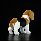 Rear view of a tricolor Beagle plush toy showing its detailed coat and lifelike posture