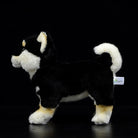 Side profile of a Black & Tan Shiba Inu plush toy, highlighting its curled tail and detailed design
