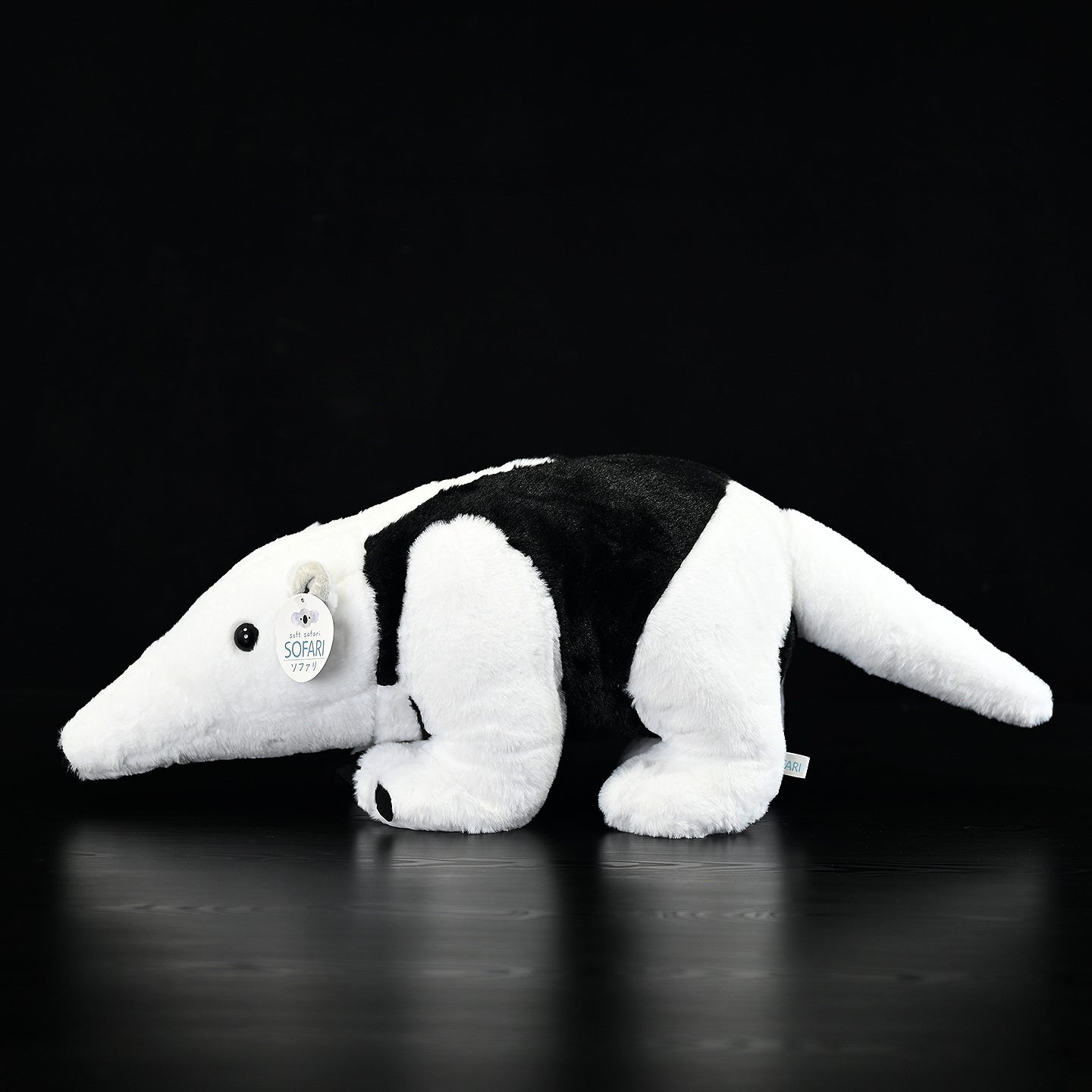 Side profile of a Southern Tamandua plush toy, perfect for animal lovers and collectors