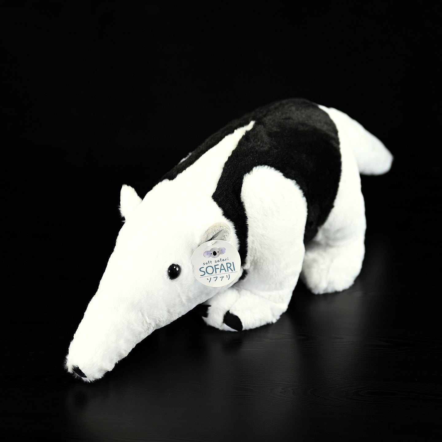 Southern Tamandua plush toy with black and white fur, perfect for cuddles and wildlife enthusiasts