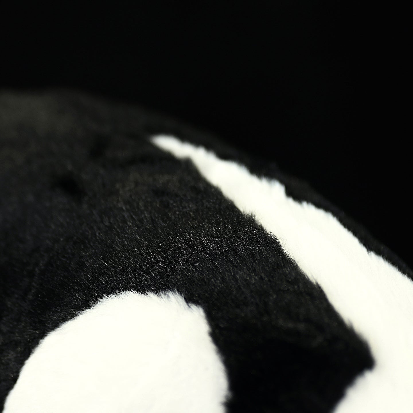 Detailed shot of the Southern Tamandua plush toy's fur, highlighting its soft and realistic texture