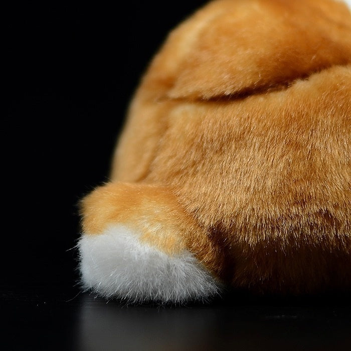 Detailed view of plush bunny’s tail with golden and white fur, showcasing soft craftsmanship by SoftDaysLab