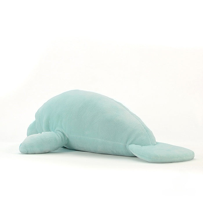 Back view of a soft manatee plush toy, highlighting its realistic paddle-shaped tail and serene design