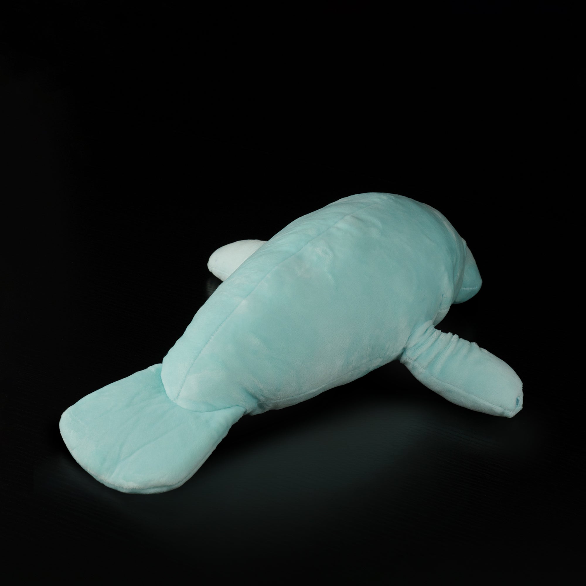 Rear view of lifelike manatee plush by SoftDaysLab®, with paddle-shaped tail and soft blue fabric