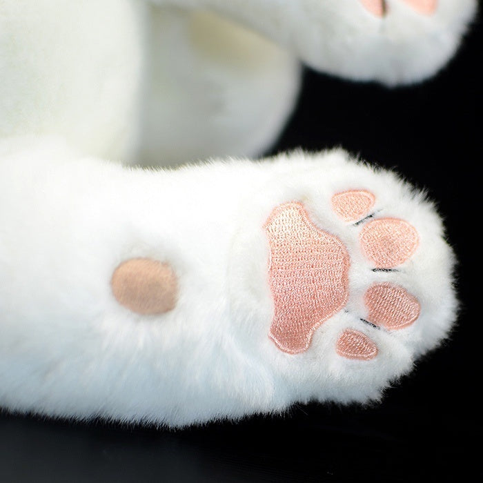 Paw detail of a white tiger plush toy, showcasing soft fabric and realistic design for collectors