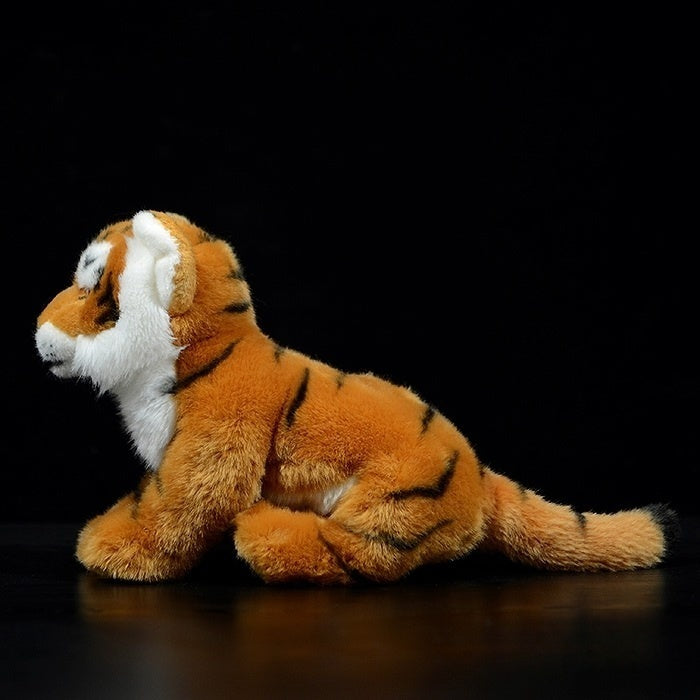 Side view of a realistic tiger plush toy with soft fur and bold stripes, ideal for animal enthusiasts