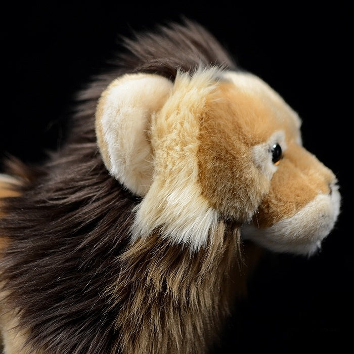 Side close-up of a lion plush toy’s head, highlighting its soft mane and lifelike features