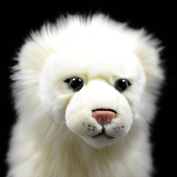 Close-up of the SoftDaysLab white lion plush toy's adorable face and lifelike features
