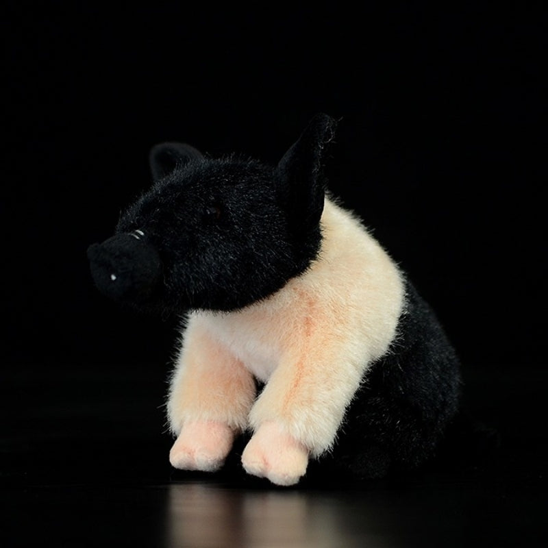 Side view of black and white mini teacup pig plush toy with lifelike design by SoftDaysLab