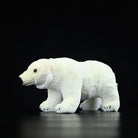 Polar bear plush toy in a walking pose, showcasing its detailed face and cuddly, lifelike texture