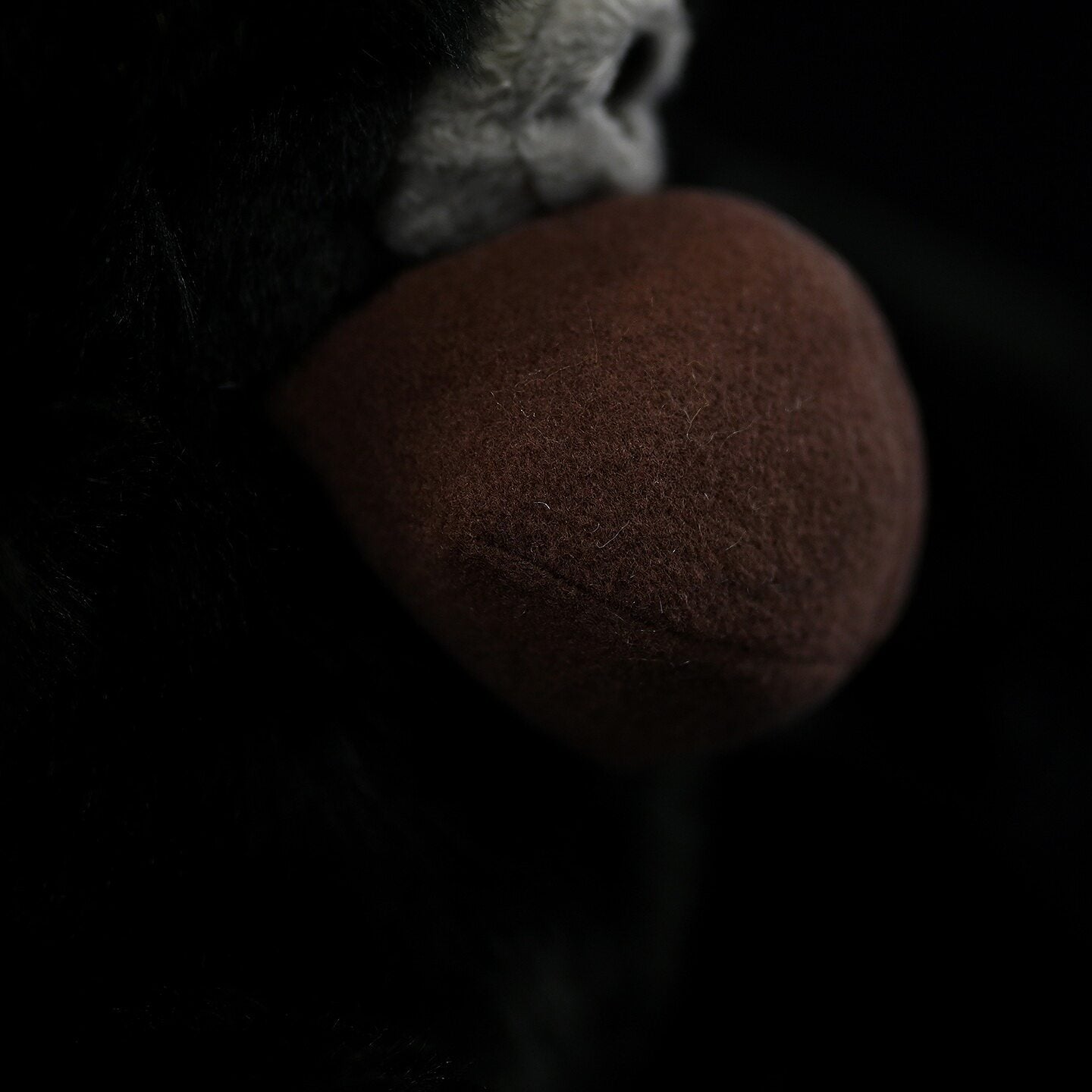 Close-up on Siamang Gibbon plush throat sac, emphasizing lifelike texture and unique design