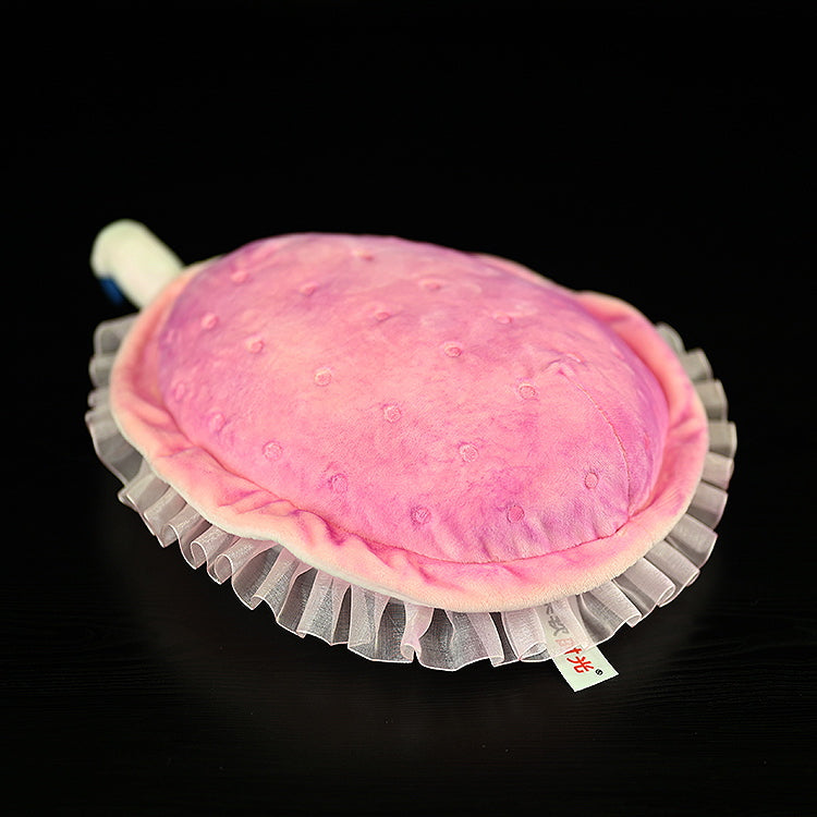 Top view of the Kimberella plush toy highlighting its soft pink surface and intricate frill design by SoftDaysLab