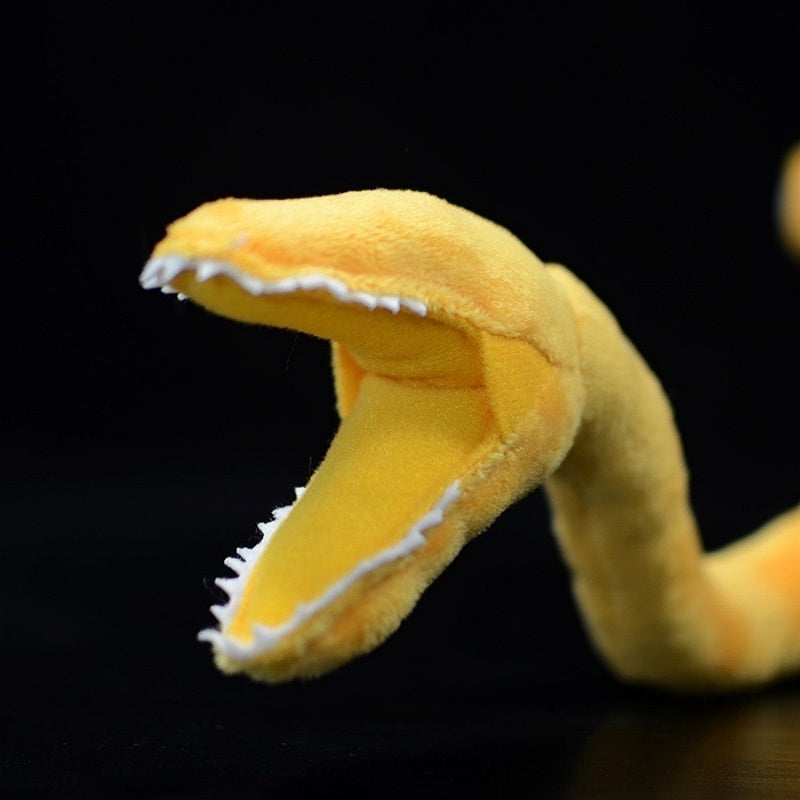 Close-up of Tully Monster plush's proboscis mouth with sharp white teeth for a detailed prehistoric look