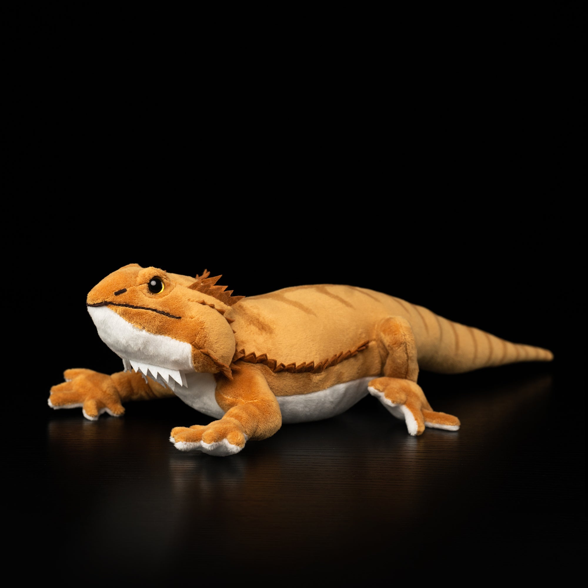 Slightly angled view of bearded dragon plush toy, showing full body with lifelike features and vivid details by SoftDaysLab