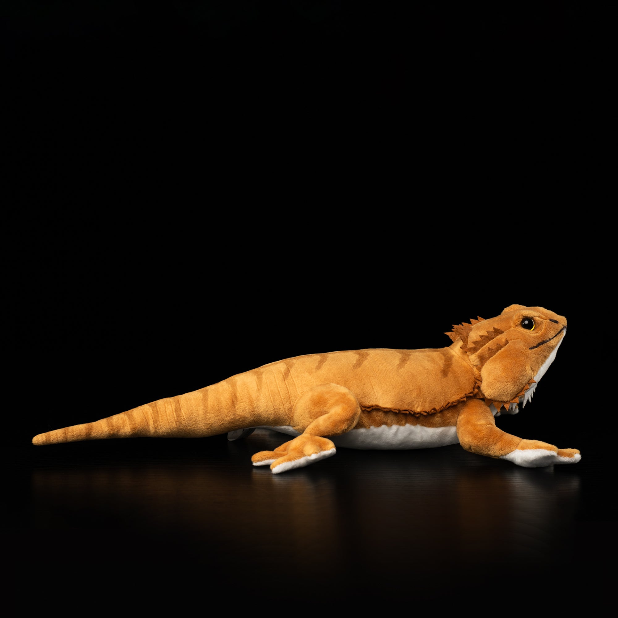 Side profile of bearded dragon plush toy with detailed body, textured skin, and long tail by SoftDaysLab