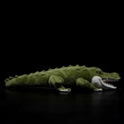 Side view of a lifelike alligator plush toy with detailed scales and a realistic design