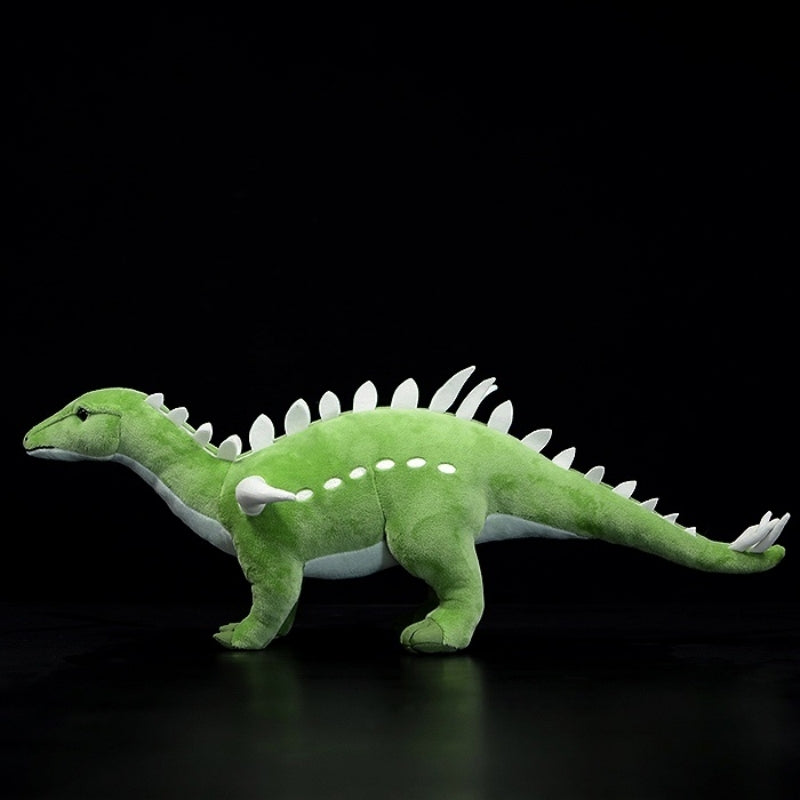 Side profile of Huayangosaurus dinosaur plush toy with vibrant green color and realistic spikes