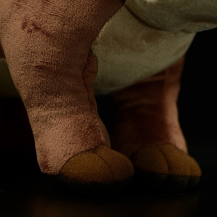 Plush feet details of Triceratops dinosaur toy, made with durable materials for cuddles and play