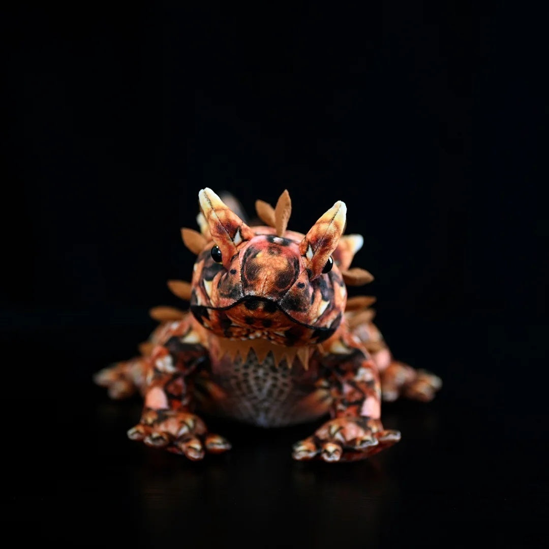 Front view of lifelike Thorny Devil Lizard Plush toy with spiny details and vibrant desert colors