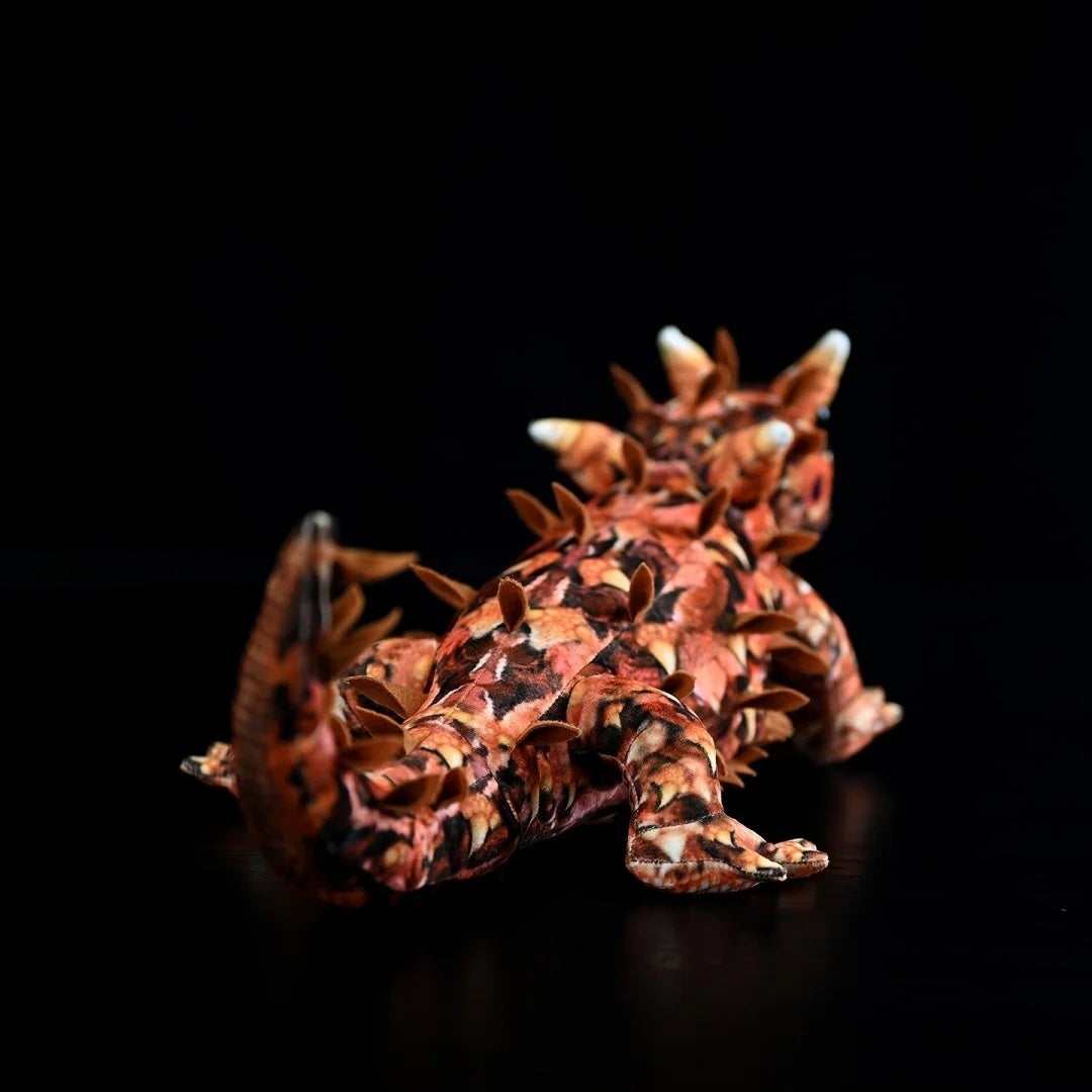 Rear view of Thorny Devil Lizard Plush toy, highlighting intricate spines and lifelike details
