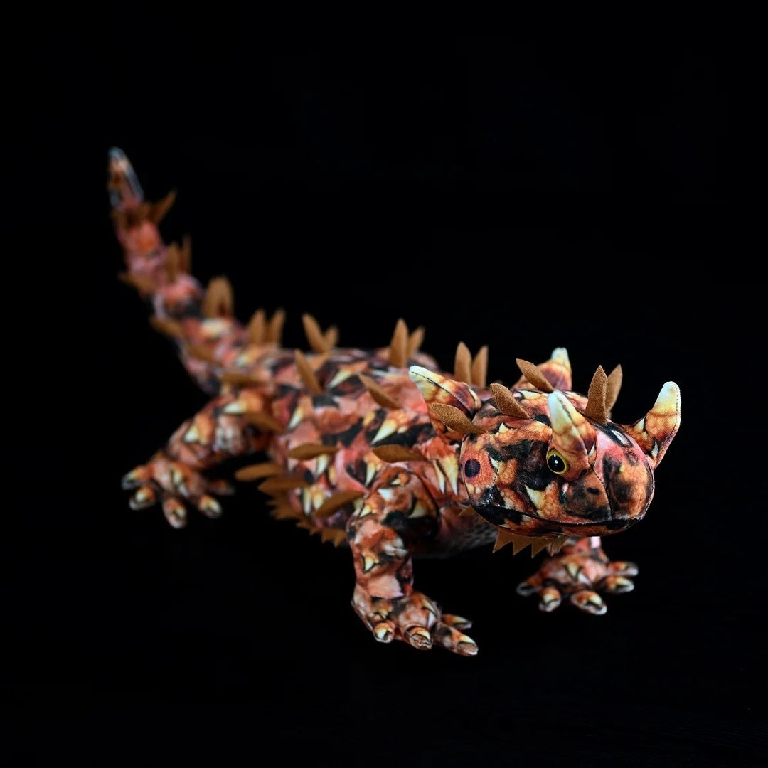 Realistic Thorny Devil Lizard Plush in a dynamic posture, featuring vibrant desert-inspired design