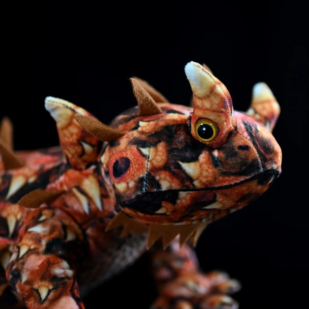 Close-up of Thorny Devil Lizard Plush showcasing lifelike eyes and realistic spiny details