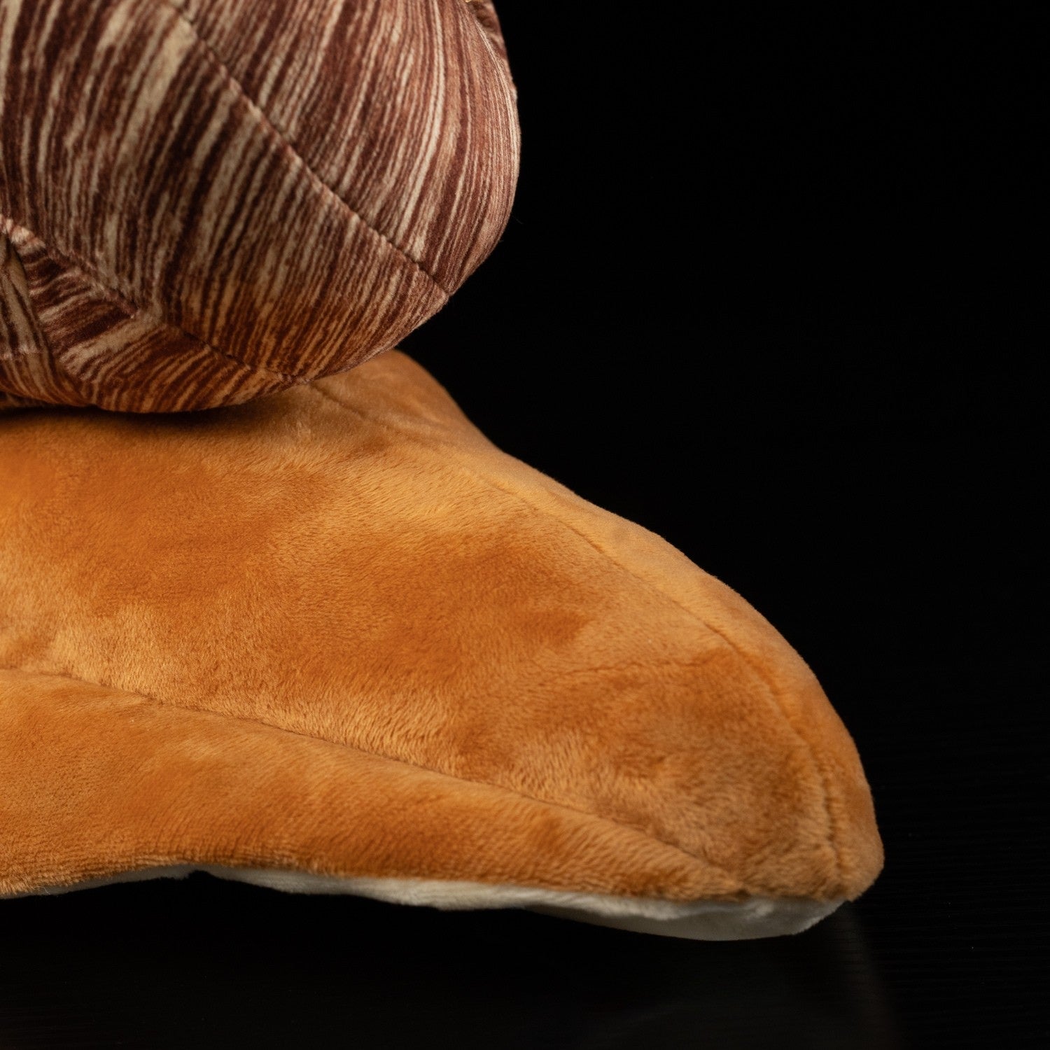 Close-up of snail plush toy’s underside highlighting soft fabric and detailed stitching by SoftDaysLab