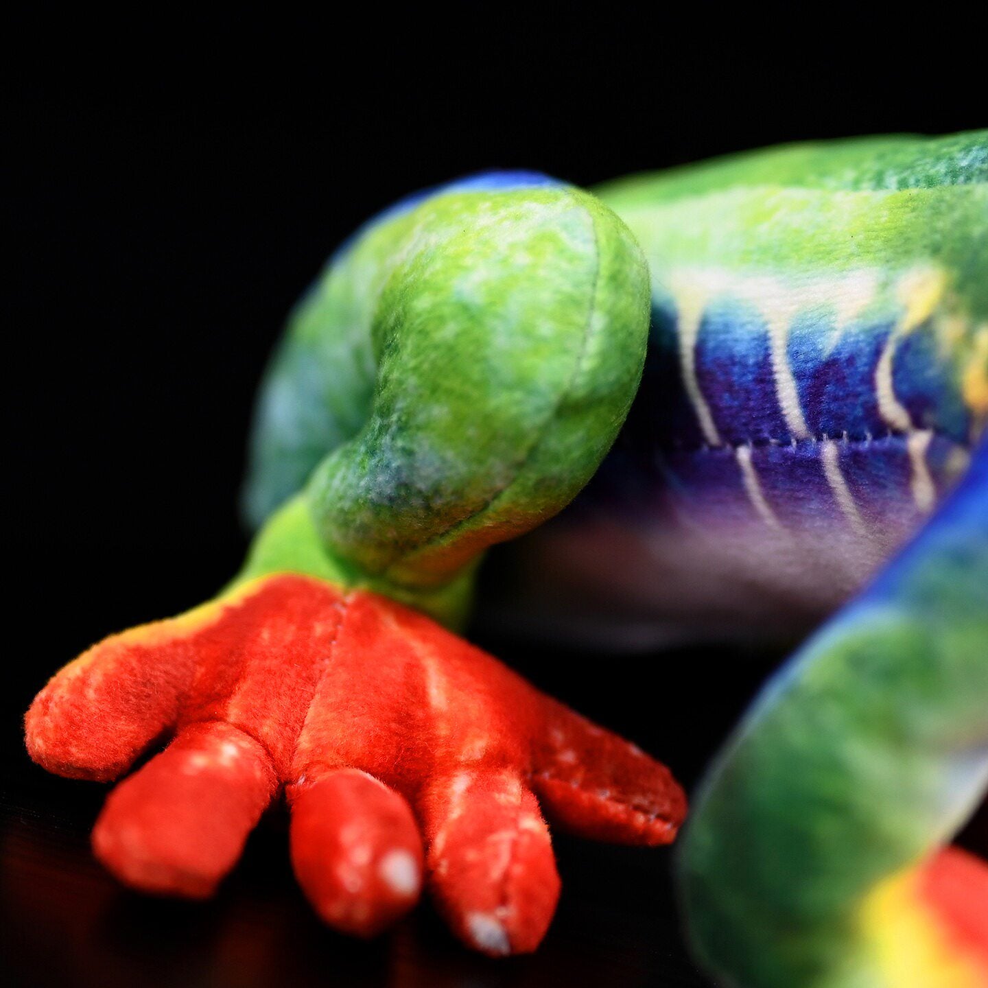 Close-up of Red-Eyed Tree Frog Plush’s vibrant green back and blue accents by SoftDaysLab