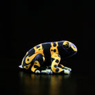 Profile view of a Yellow-Banded Poison Dart Frog Plush featuring detailed craftsmanship and bold colors