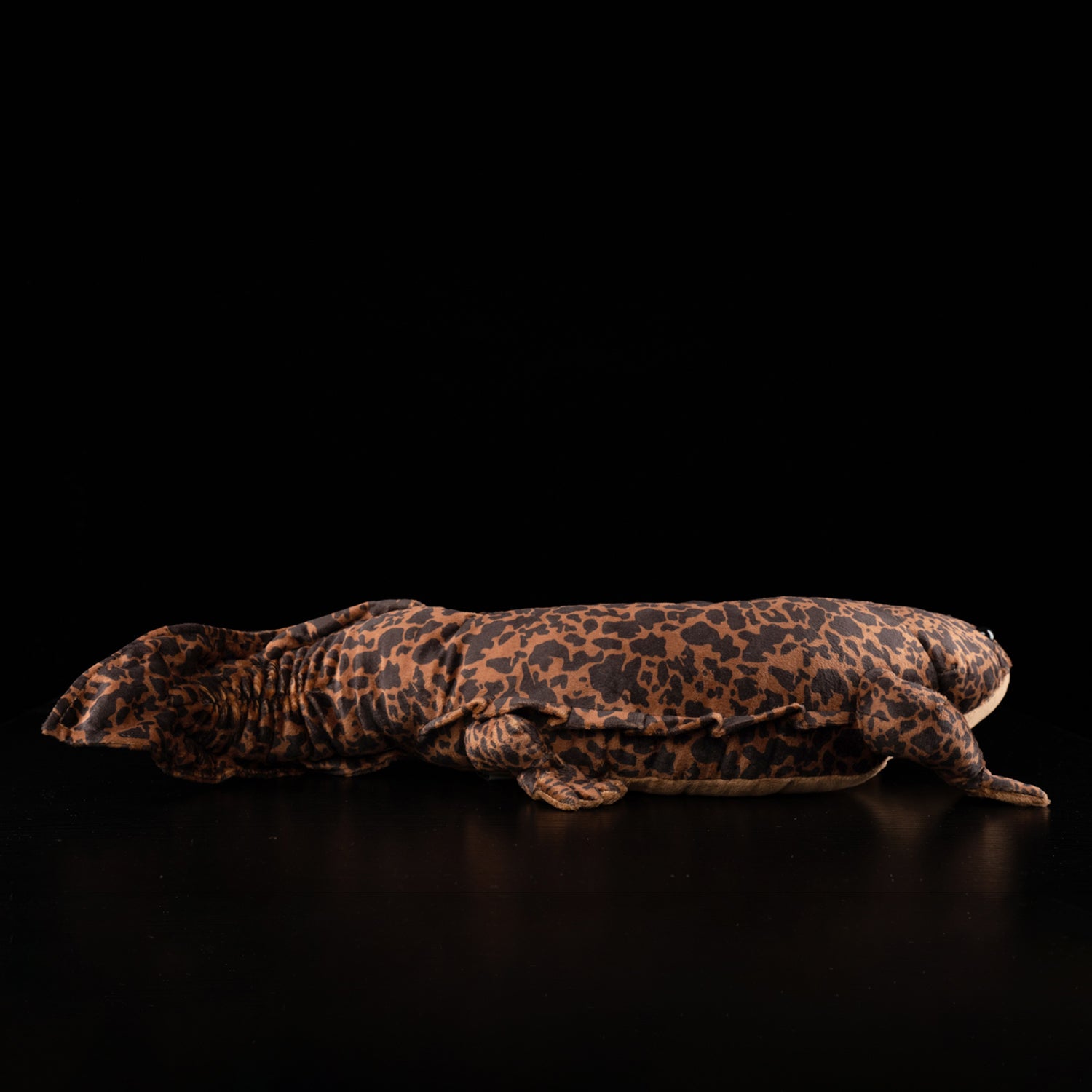 Side profile of Chinese Giant Salamander plush toy, showcasing realistic design and detailed craftsmanship
