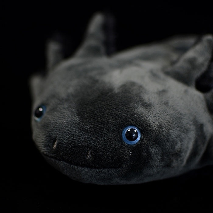 Close-up of Black Melanoid Axolotl Plush face by SoftDaysLab, with lifelike eyes and detailing