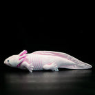 Side view of pink axolotl plush toy by SoftDaysLab, showcasing lifelike design and delicate details