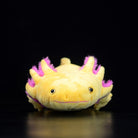Front view of the adorable Golden Albino Axolotl plush with pink gills and a charming smile