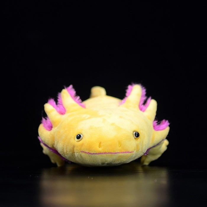Front view of the adorable Golden Albino Axolotl plush with pink gills and a charming smile