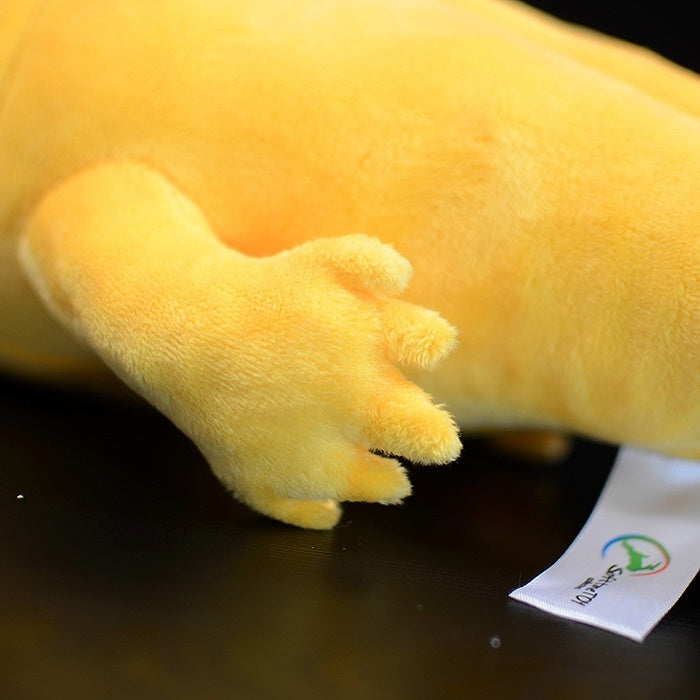 A close-up of the plush axolotl’s realistic golden paw, showcasing its high-quality craftsmanship