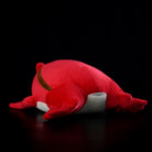 Rear view of tomato frog plush toy, highlighting its pillow-like design and smooth contours for comfort
