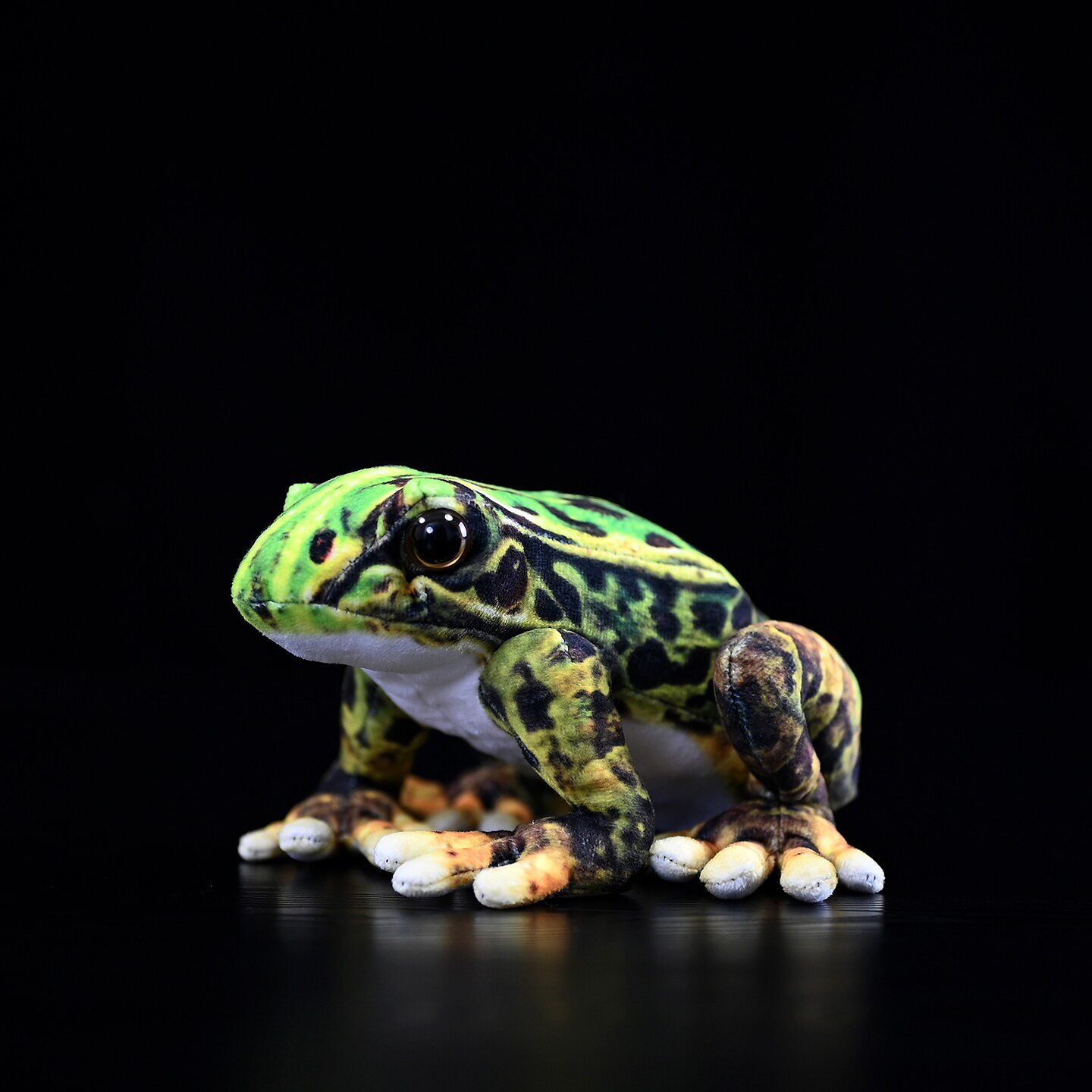 Side view of lifelike Japanese Black-spotted Pond Frog Plush by SoftDaysLab, showcasing realistic details