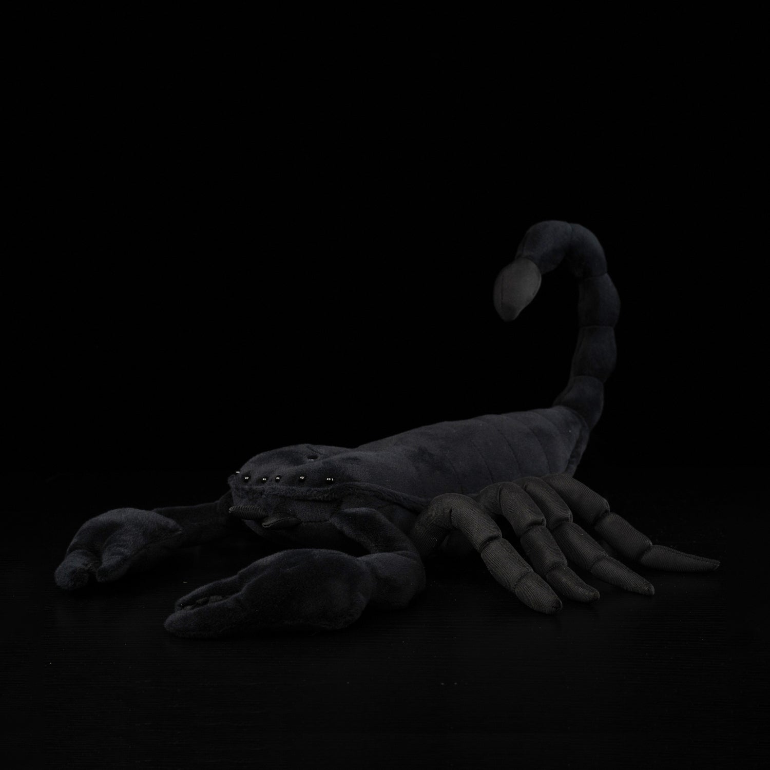 Realistic Emperor Scorpion plush toy by SoftDaysLab, featuring lifelike details and soft black fabric
