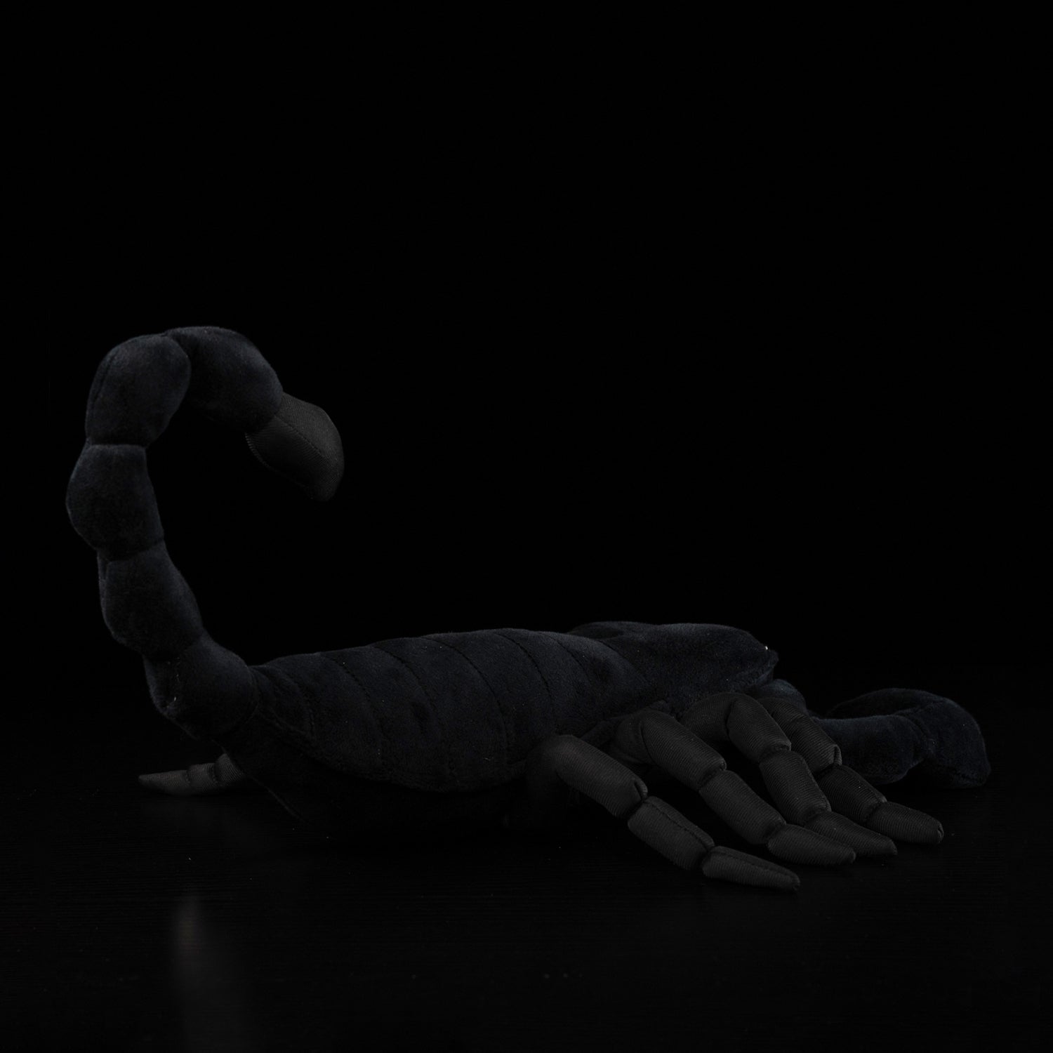 Back view of Emperor Scorpion plush with a curved tail and segmented legs, ideal for wildlife enthusiasts
