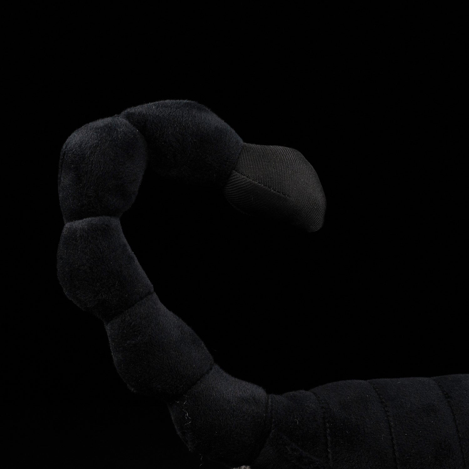 Zoomed-in view of the Emperor Scorpion plush tail, curved and detailed for an authentic scorpion look