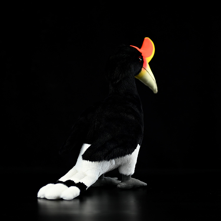 Back angle of a Rhinoceros Hornbill plush toy with detailed black and white plumage