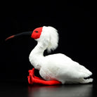 Side profile of Asian crested ibis plush with elegant design and lifelike features, created by SoftDaysLab
