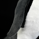 Close-up of king penguin plush wing with soft fabric texture, lifelike design for penguin enthusiasts