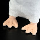 Adélie penguin plush feet close-up, soft and realistic for nature-inspired fun