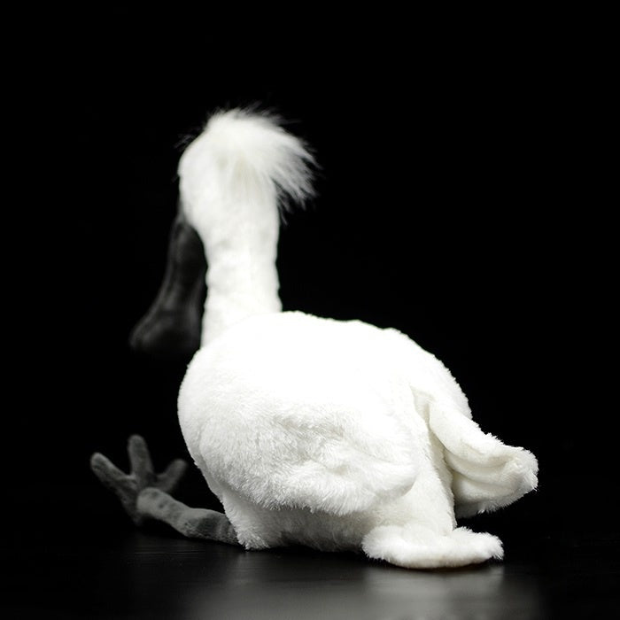 Back view of black-faced spoonbill plush toy, showcasing detailed tail and lifelike design by SoftDaysLab
