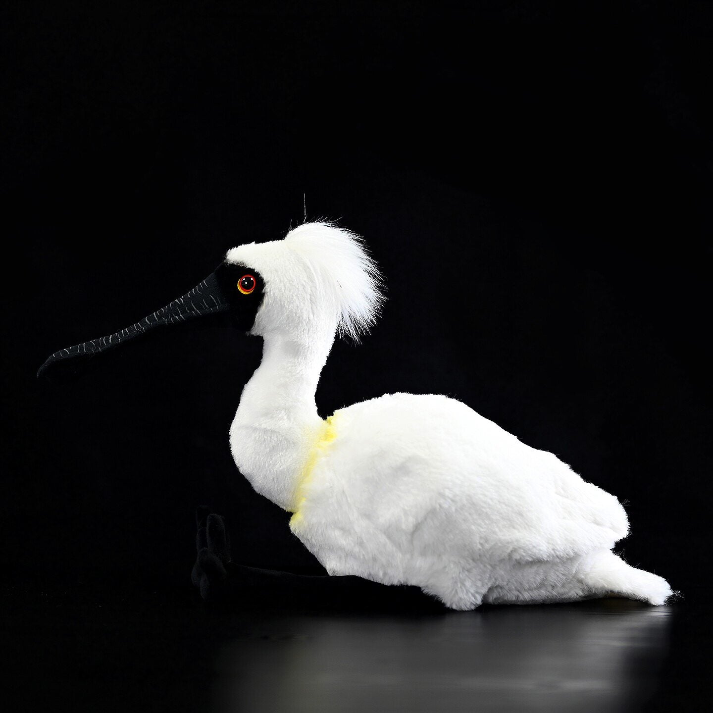 Profile view of the elegant Black-faced Spoonbill Plush Toy highlighting its realistic features