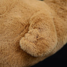 Close-up of dodo plush toy's soft and fluffy wing design, showcasing realistic craftsmanship