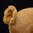 Detailed view of the dodo plush toy’s rounded tail, emphasizing its lifelike and plush texture